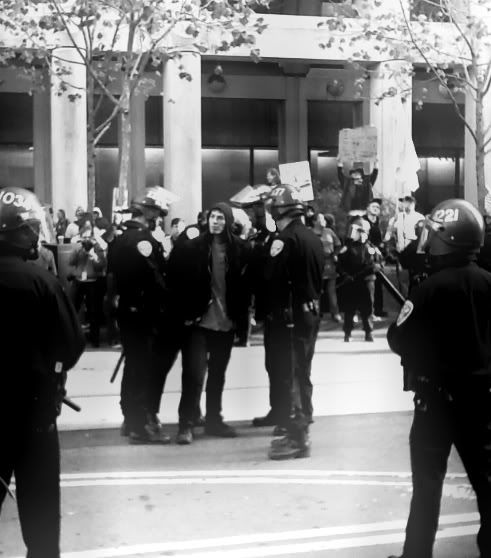 One Arrest, Two dozen San Francisco cops arrest one non-violent OccupySF protester Dec. 7, 2011 on Market St.